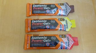 NamedSport Isotonic Power Energy Gels for cycling on a wooden table