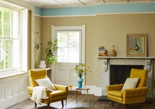 living room with lime plaster painted in pale yellow claypaint