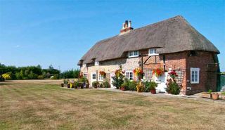 Chichester thatched cottage for sale