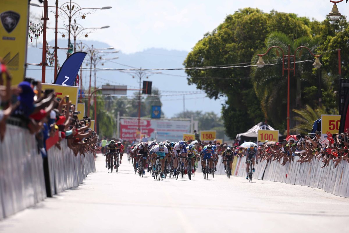 It was a long wide sprint for the peloton