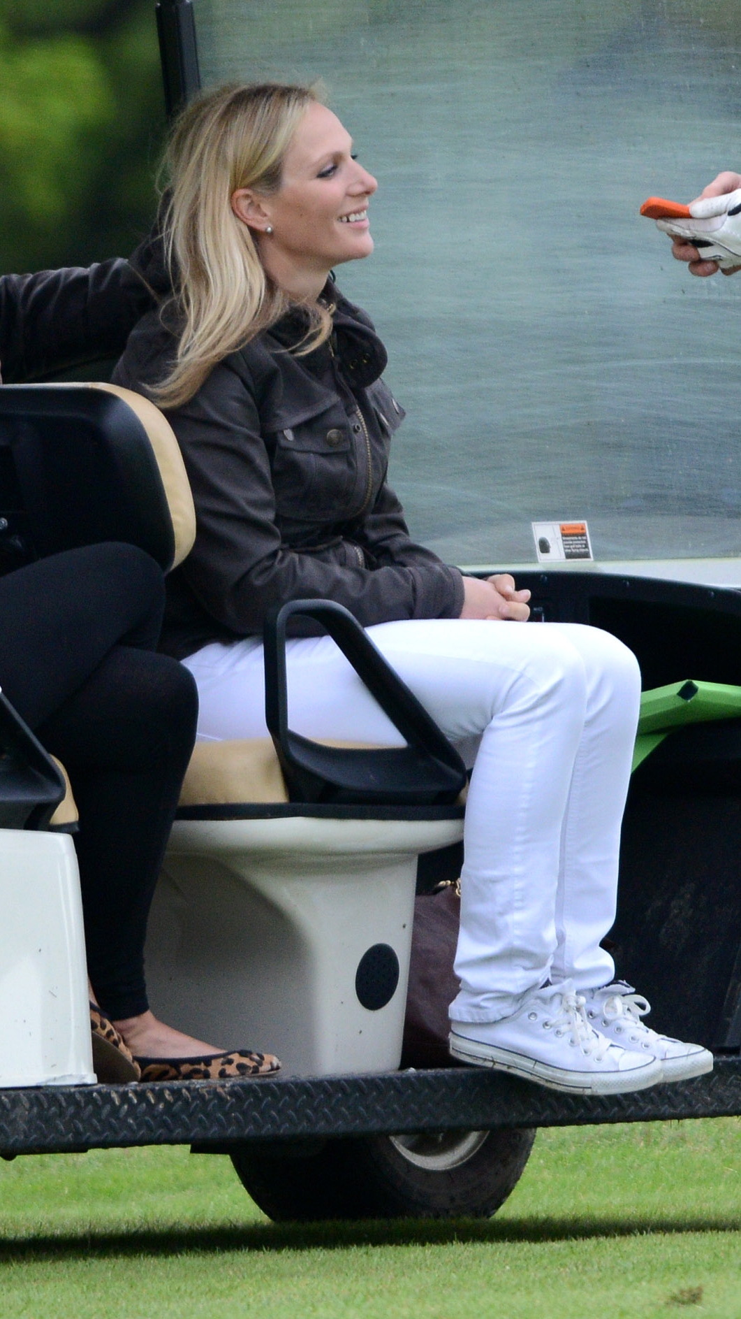 Zara Tindall watches her husband Mike Tindall (out of picture) in the celebrity golf classic at Mannings Heath Golf Club on May 20, 2013