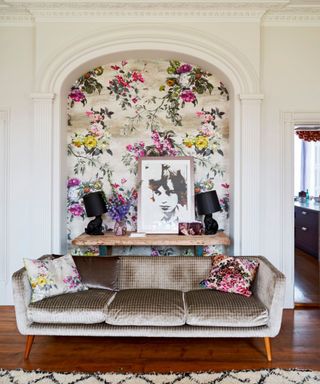 living room with wallpapered alcove