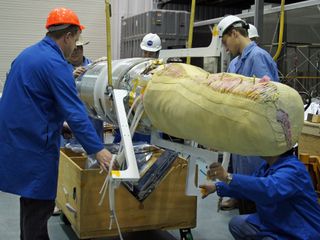 The 10-foot- diameter Inflatable Reentry Vehicle Experiment (IRVE-3) is packed, uninflated, into a flight bag that fits inside a 22-inch diameter nose cone. The experiment will launch on a suborbital rocket July 21, 2012.