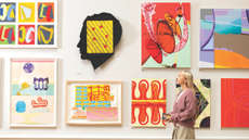 A wall of artworks displayed at the Royal Academy
