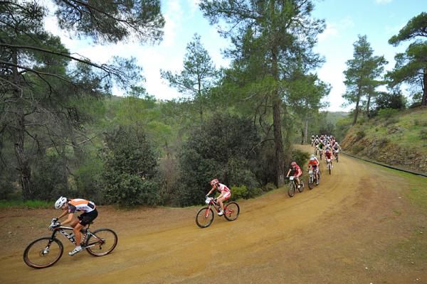 The women race on the start loop of stage 3