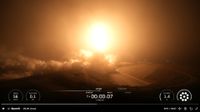 A bright fireball illuminates a dark predawn setting.