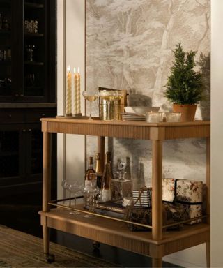 bar cart storage ideas styled for the holidays by shea mcgee