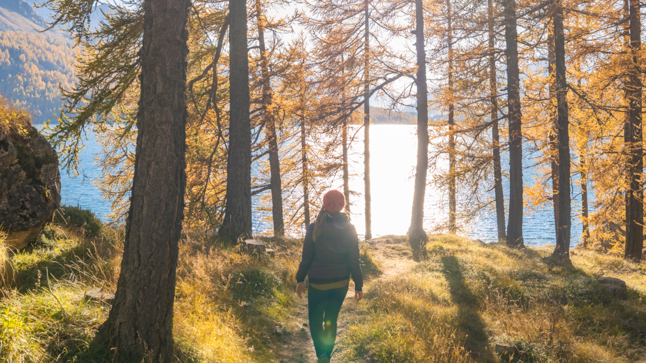 Woman walking in the woods