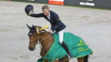 Max K&uuml;hner with Elektric Blue winner of the Rolex Grand Prix at Indoor Brabant 2021