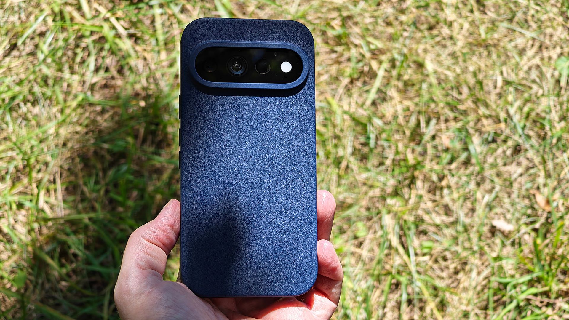 A blue Dbrand MNML case on a Google Pixel 11 Pro