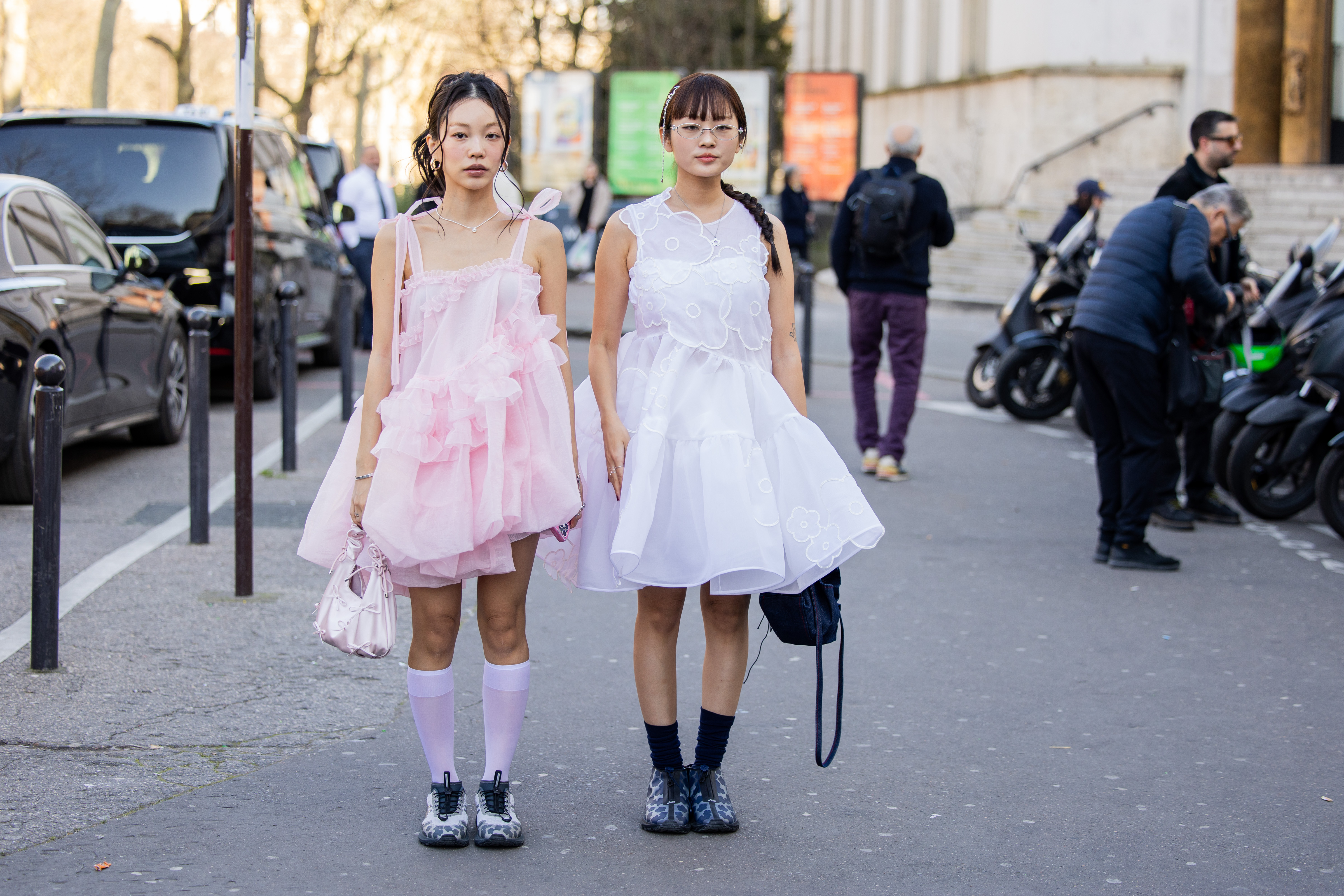two women at fashion week wearing cecilie bahnsen dresses
