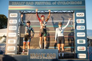 The women's elite podium on day 1 of the Really Rad Festival of Cyclocross 2023, with Maghalie Rochette (Canyon Collective) first, Caroline Mani (Groove Off-Road Racing) second and Sidney McGill (Cervélo/OrangeLiving) third