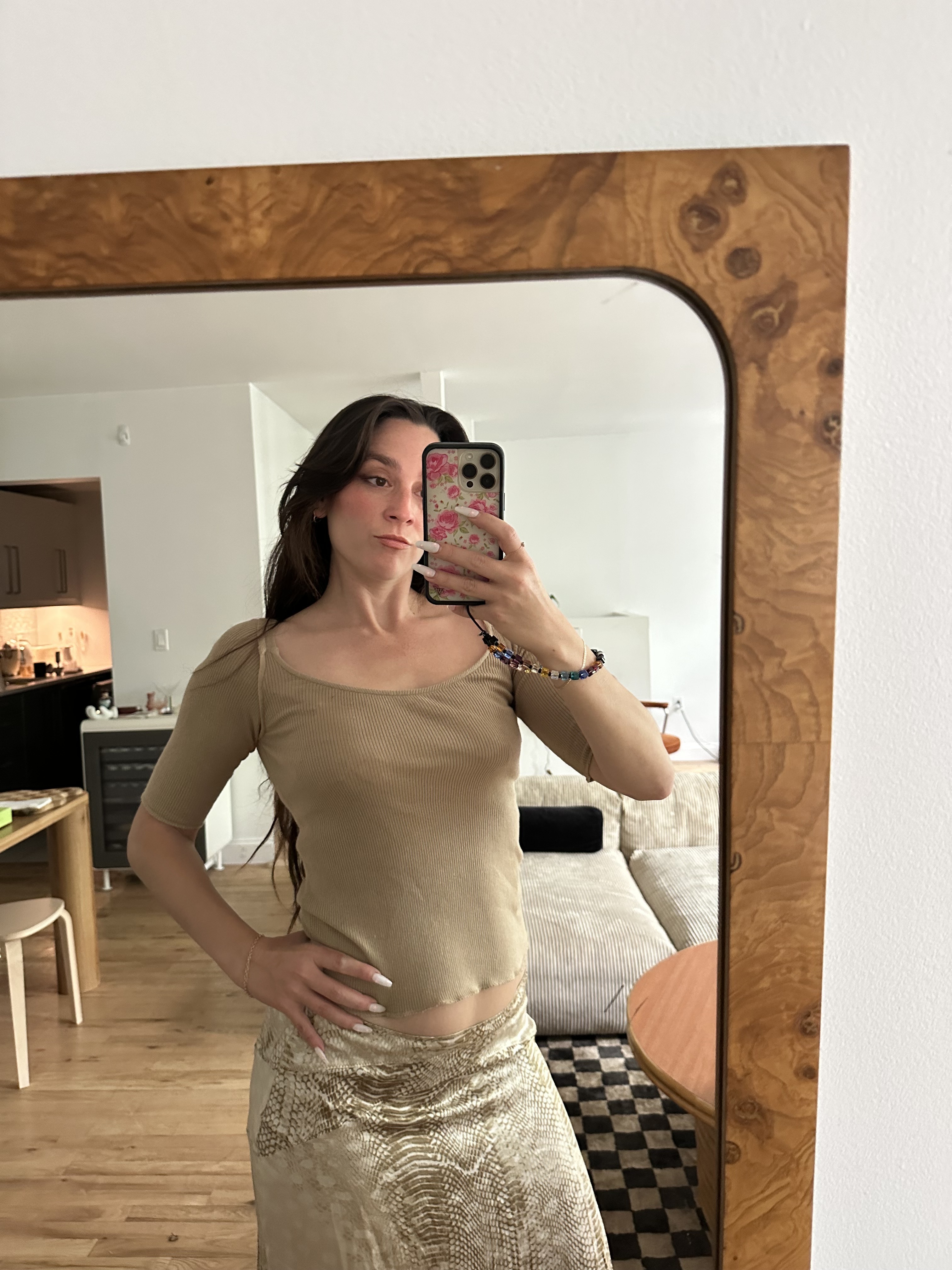Fashion editor wearing a cone bra in a selfie