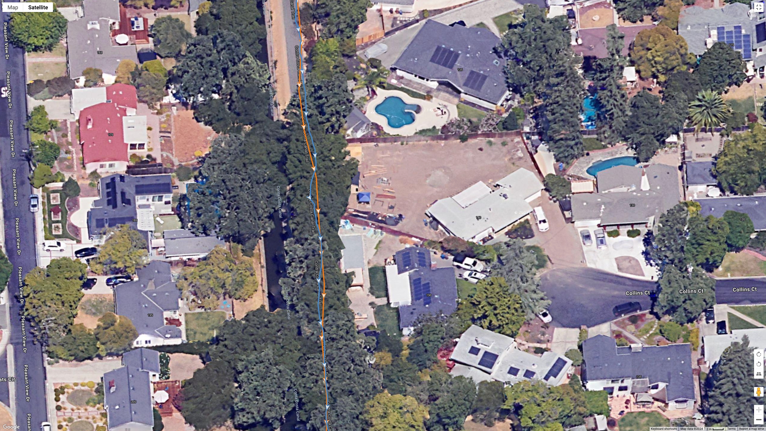 A Google Maps satellite view showing how the Polar Vantage M3 (blue line) and Garmin Fenix 8 (orange line) compared for GPS accuracy during a run.