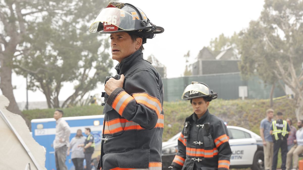 Rob Lowe and Julian Works in the field as Owen and Mateo in 9-1-1: Lone Star