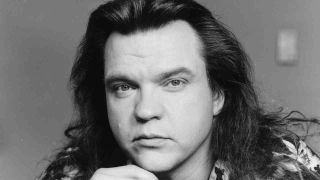 Meat Loaf posing for a photograph in 1987