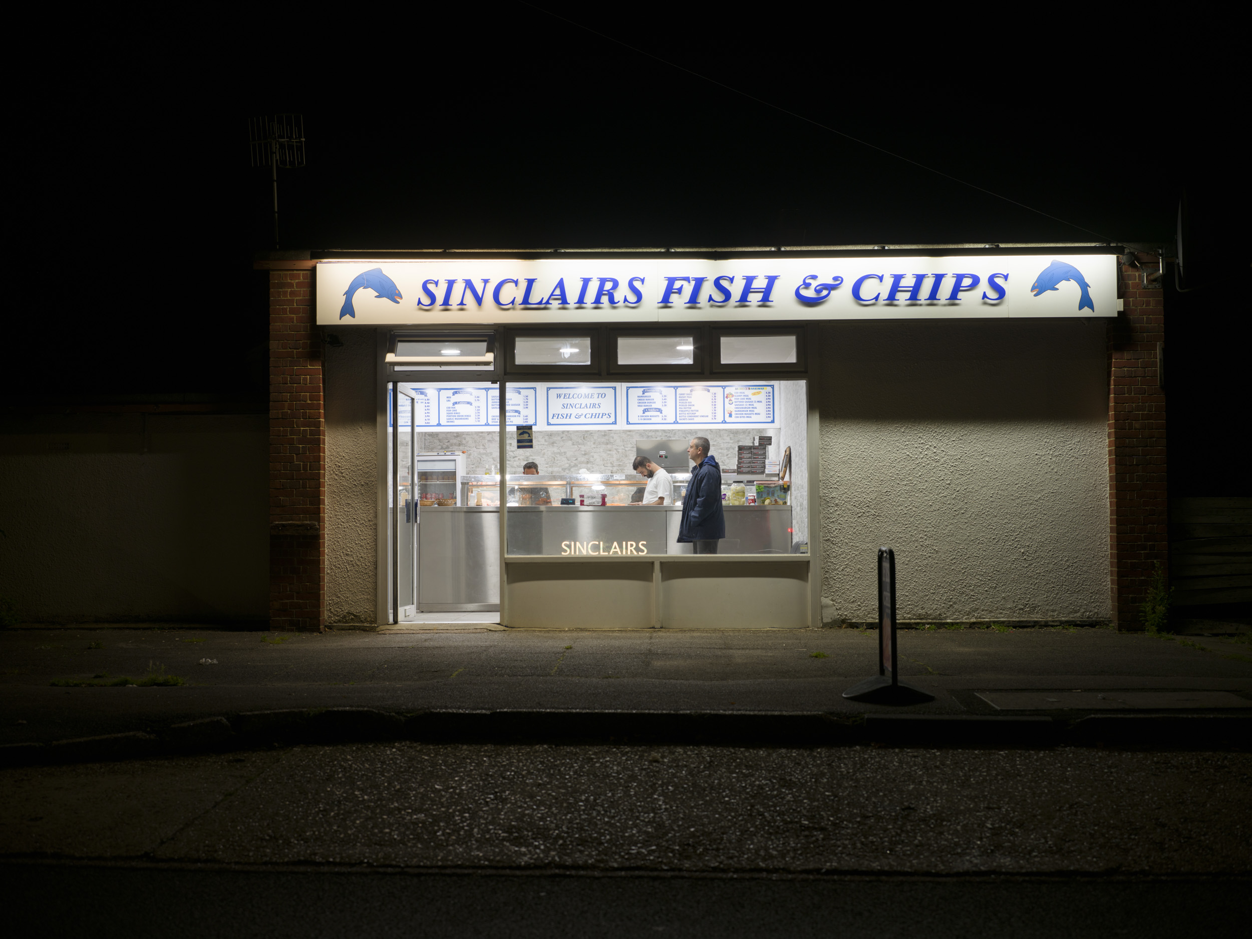Sample image taken with the Hasselblad X2D 100C of a fish and chip shop at night and brightened +3EV