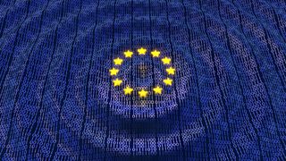 EU flag render shown as 12 gold stars hovering and creating a ripple effect in a wave of blue data