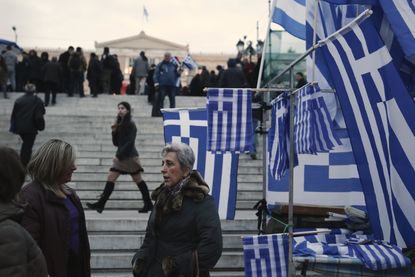 Greek flags for sale in Athens. 