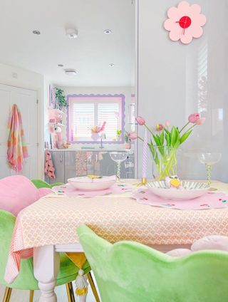 A pink dining table in a kitchen