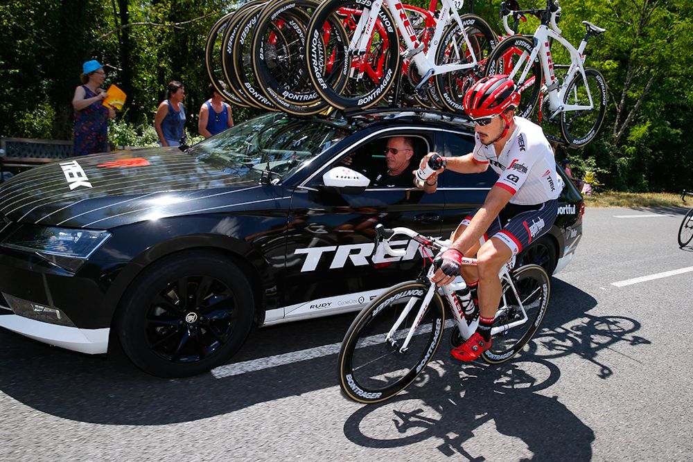 John Degenkolb gets a bottle from the Trek-Segafredo team car