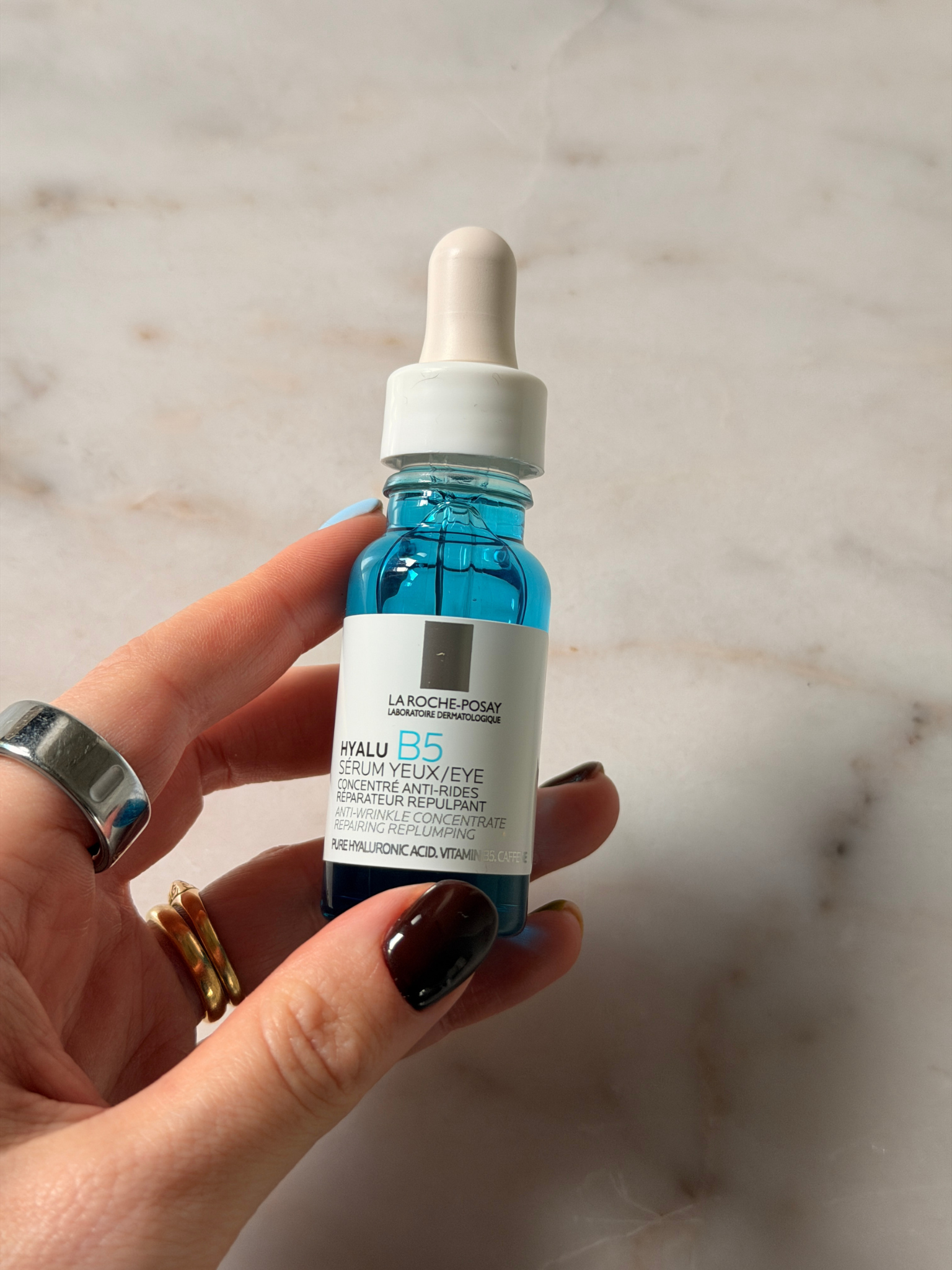 Freelance beauty editor Grace Day holding the La Roche-Posay eye cream