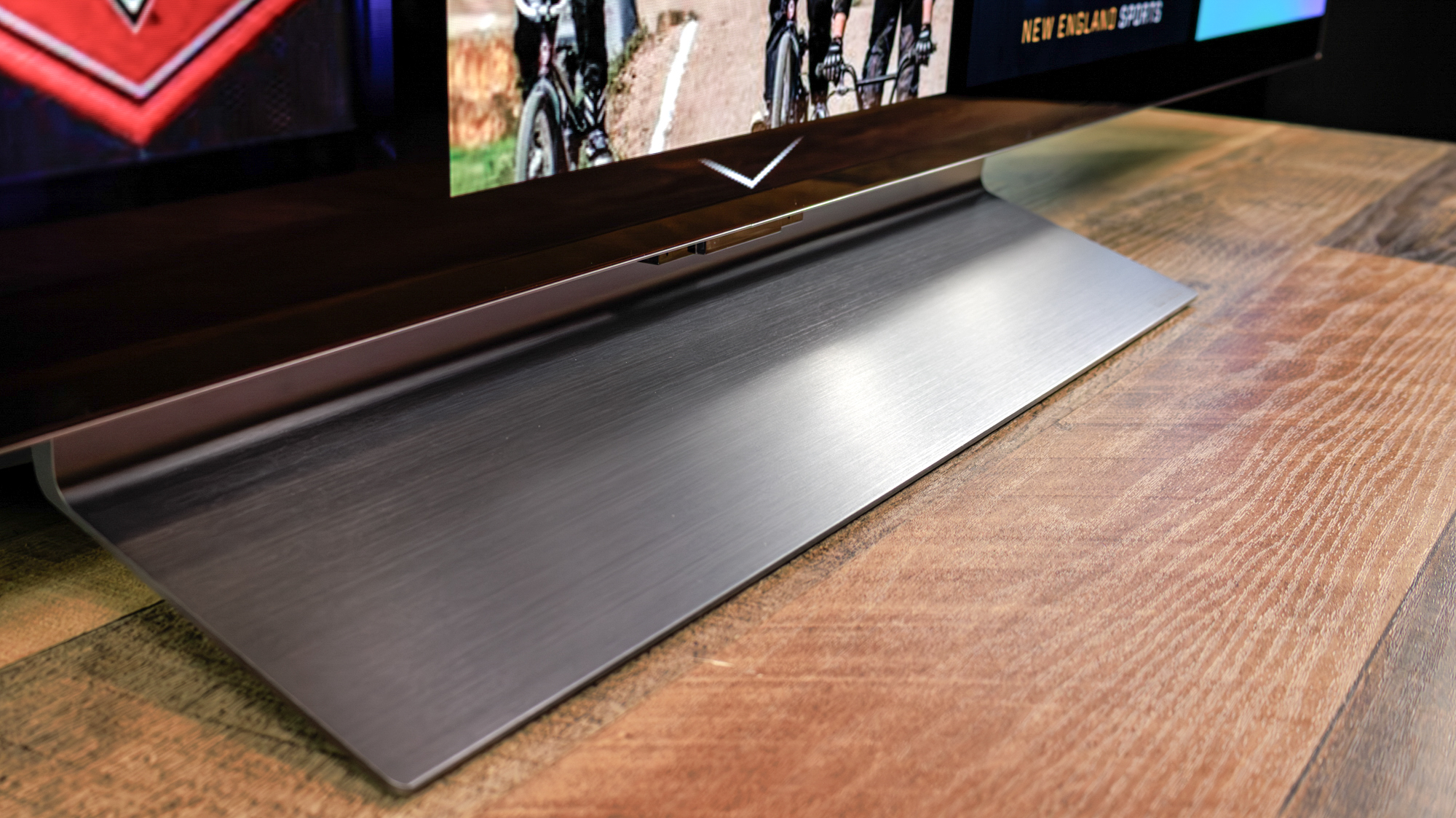 LG C6 OLED TV shown on a wood table