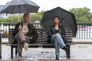 otto and harper have a conversation on a rainy park bench in the industry season 3 finale