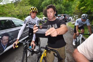 A fan gets a selfie with Chris Froome