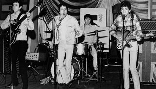(from left) The Who's John Entwistle, Roger Daltrey, Keith Moon and Pete Townshend perform in 1964