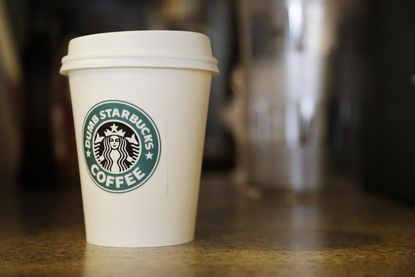 Starbucks will roll out a delivery service next year
