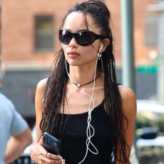 Zo&euml; Kravitz stayed loyal to the ballet flats trend in a high-vamp bow-tied pair