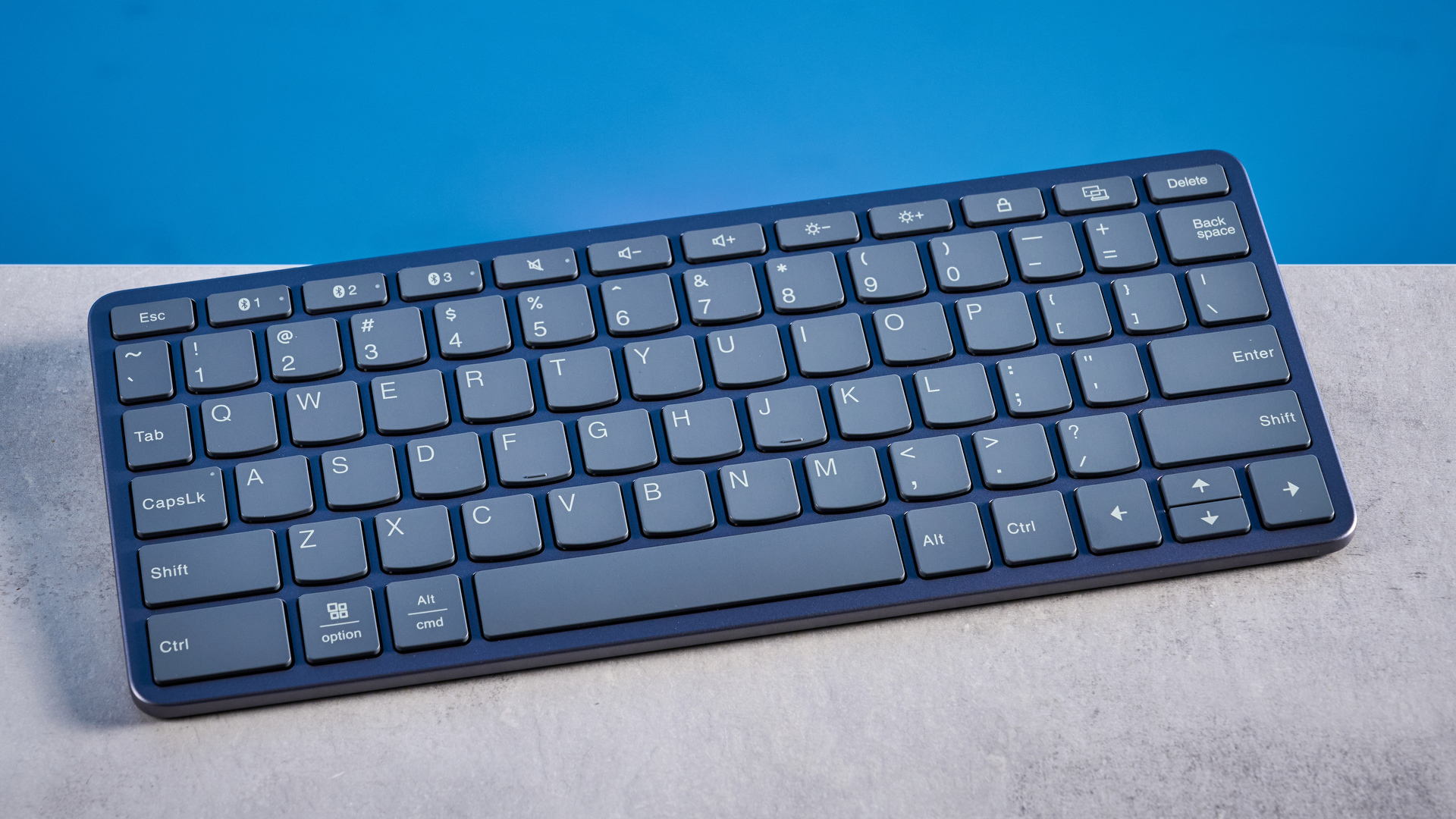 Lenovo Multi Device Keyboard photographed in front of a blue background. 