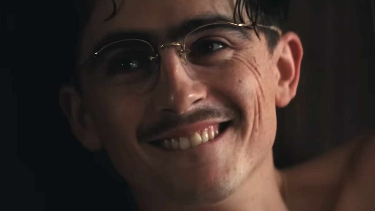 Timothee Chalamet smiling as Marty Mouser in Marty Supreme