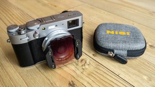 Fujifilm X100V with NiSi square filters attached to the lens