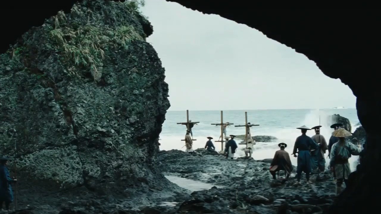 People being crucified outside a cave in Silence