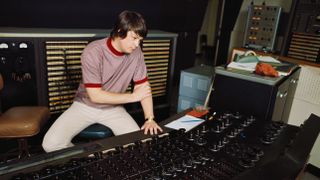 Singer and mastermind Brian Wilson of the rock and roll band "The Beach Boys" directs from the control room while recording the album "Pet Sounds" in 1966 in Los Angeles, California