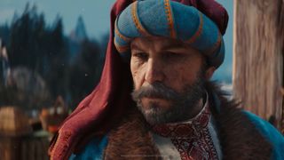A merchant in a red and blue cap in The Witcher 4