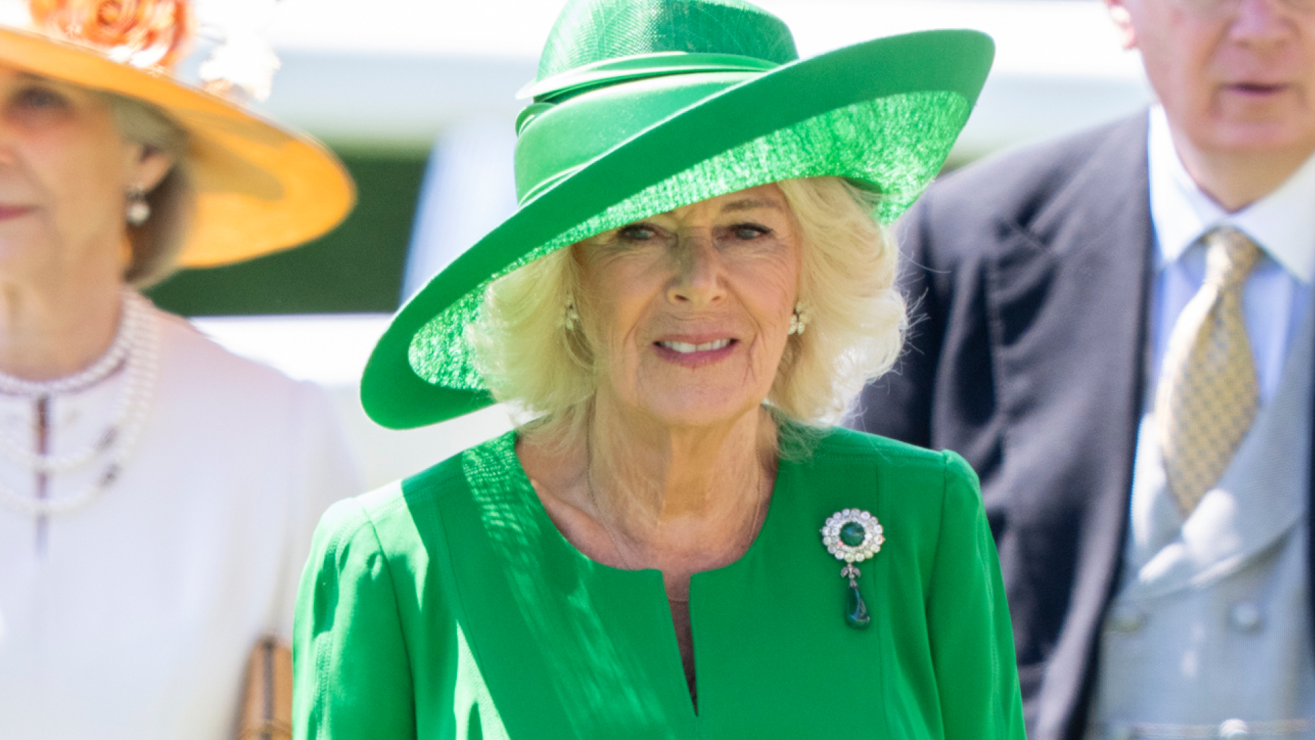 Queen Camilla wearing the Cambridge Cluster Emerald and Diamond Brooch at Royal Ascot 2025