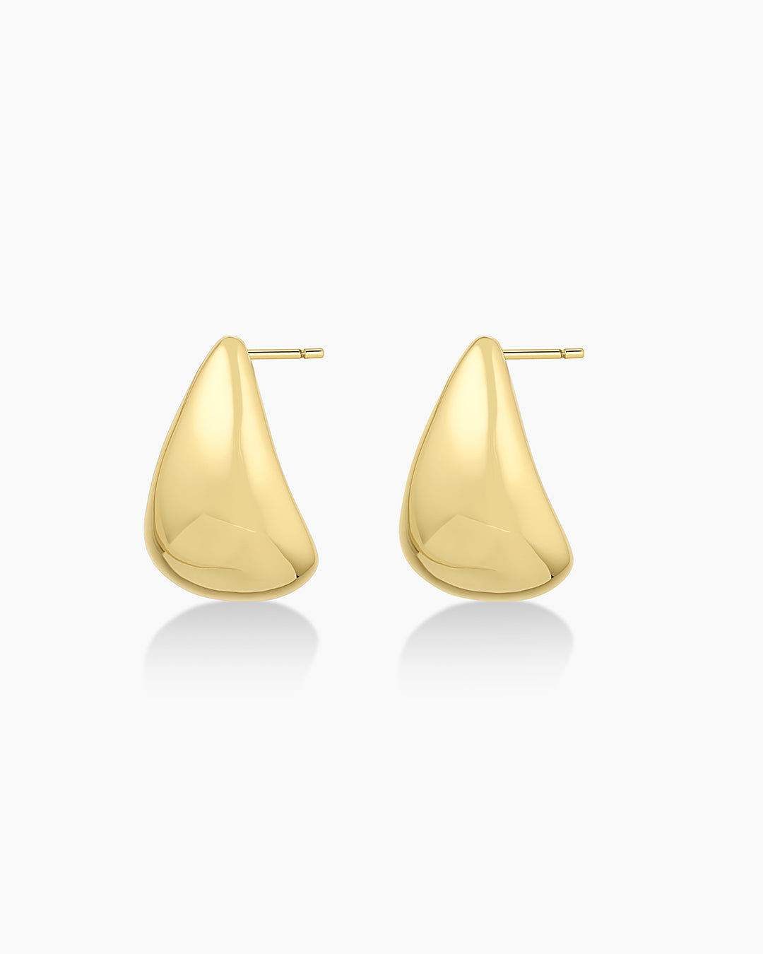 Banks Earrings in front of a plain backdrop
