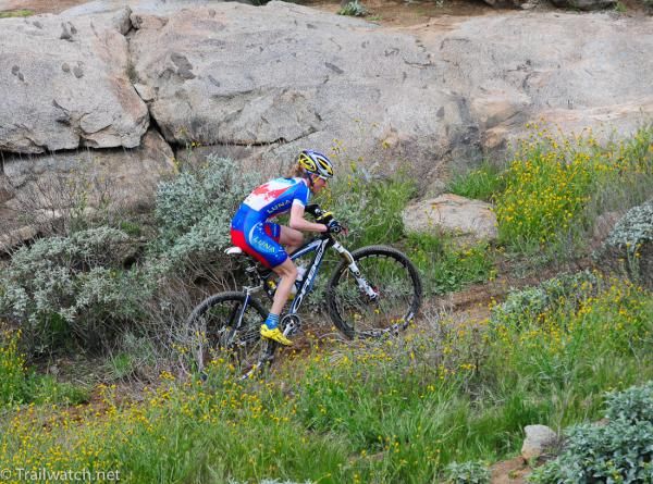 Catherine Pendrel (Luna Pro Team) climbs the mountain alone on the last lap