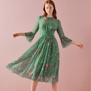 green floral midi dress with fluted sleeves