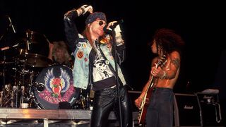 Axl Rose and Slash of Guns N' Roses at the Poplar Creek Music Theater in Hoffman Estates, Illinois, July 19, 1988. (Photo by Paul Natkin/Getty Images)