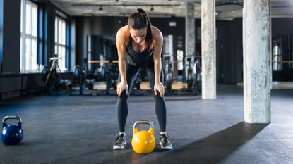 Woman taking a break during workout