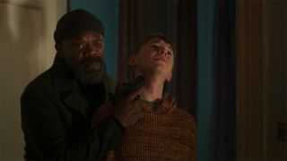 Scene from the Marvel TV show Secret Invasion. Here we see a still from Secret Invasion season 1 episode 3 - Nick Fury holds Bob’s kid hostage.