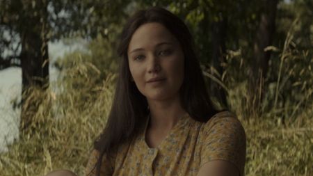 Katniss holding her baby in a field at the end of Mockingjay - Part 2