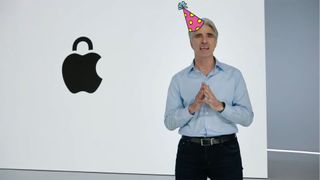Craig, with the good hair, in a party hat at an Apple event