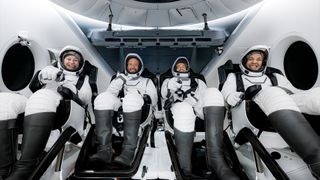 The Polaris Dawn crew of Anna Menon (at left), Scott Poteet, Jared Isaacman and Sarah Gillis seen aboard Dragon &quot;Resilience&quot; after their splashdown and recovery, Sept. 15, 2024. 