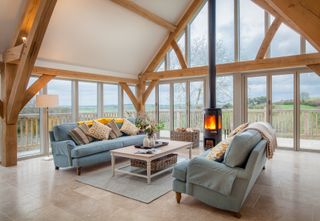 oak frame living room with view across countryside