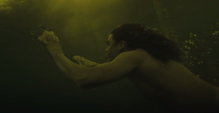 A siren under the water with webbed hands
